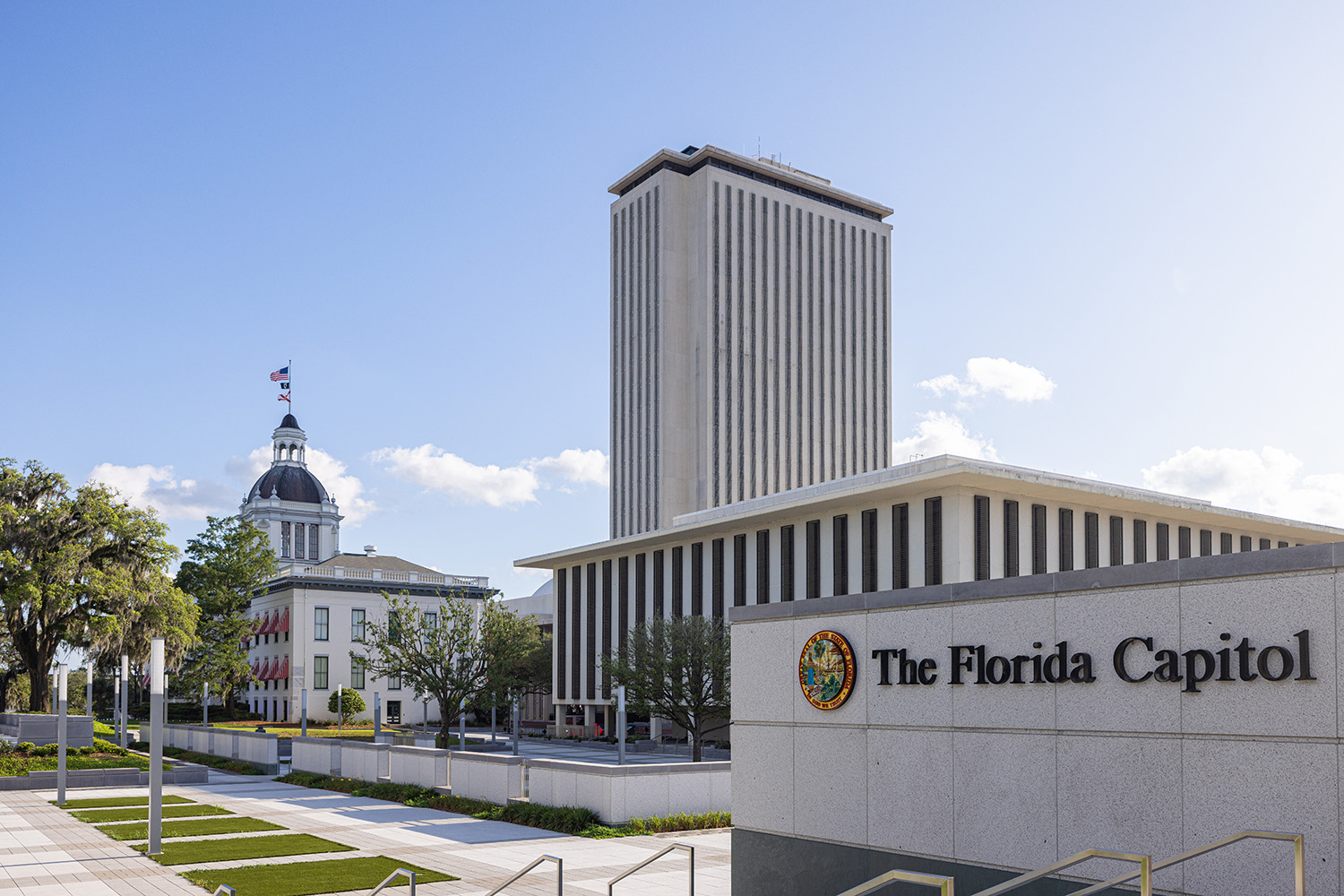 The Florida Capitol complex in Tallahassee, featuring the modern high-rise Capitol building and the historic Old Capitol building.