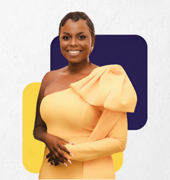 ebony thyme with short hair in a yellow one-shoulder dress